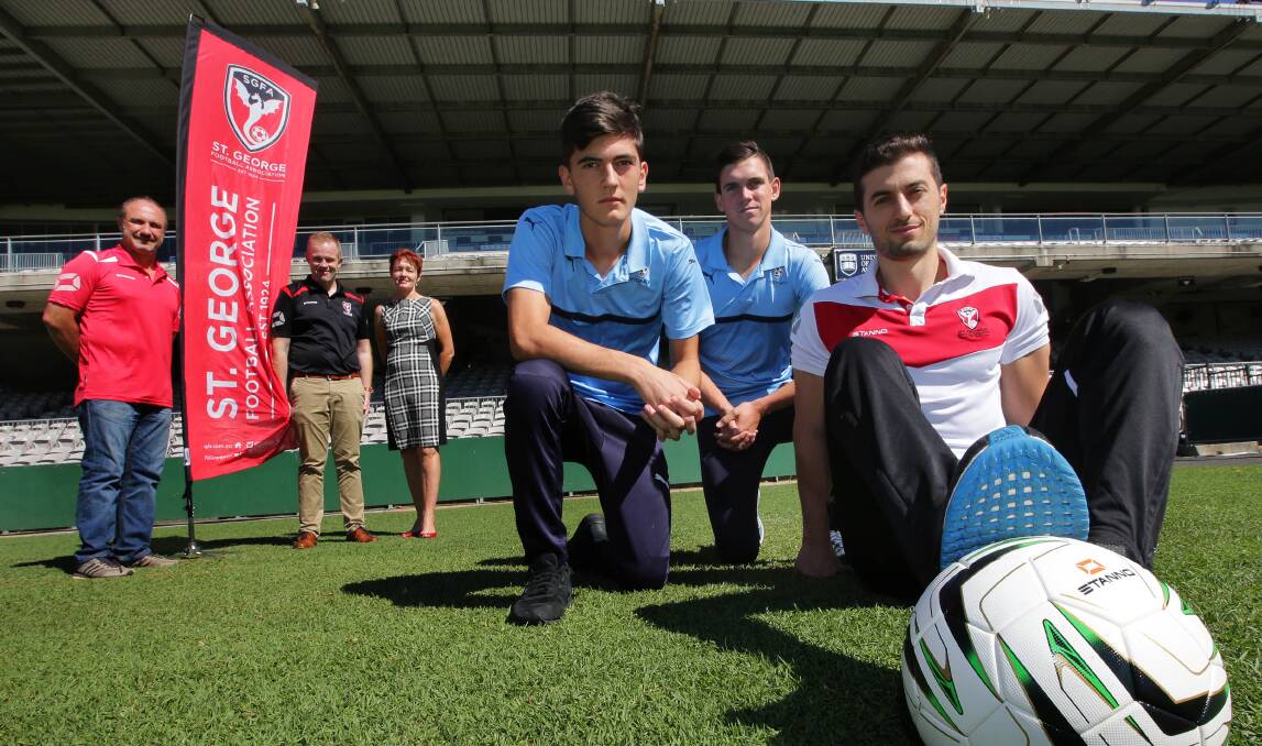Open season: St George FA's Aytek Genc and Craig Kiely, Georges River Council's Gail Connolly, Sydney FC players Andrea Agamemnonos and Brendan Curtis and St George City player Bill Tsanidis. Picture: John Veage