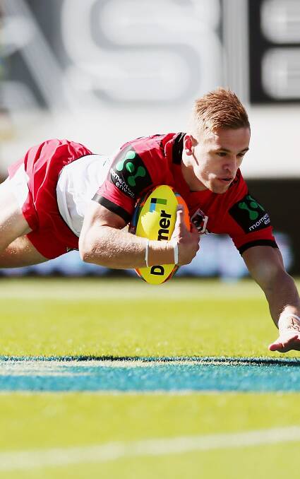 Try time: Matt Dufty scores for the Dragons at the Auckland Nines. The youngster was a star in the Holden Cup competition. Picture: Anthony Au-Yeung/Getty Images