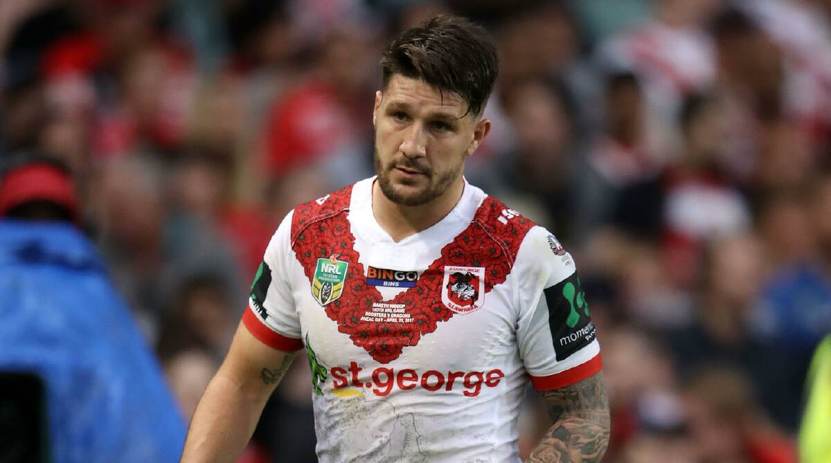 Injured: Dragons captain Gareth Widdop hobbles off with a knee injury. Picture: Getty Images
