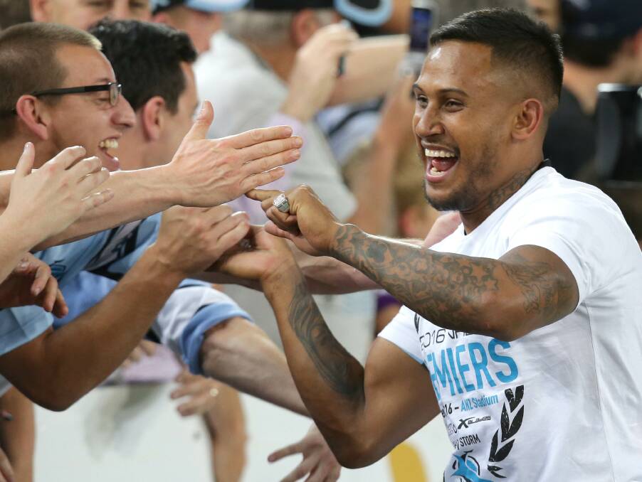 Released: Ben Barba, pictured celebrating the grand final win, was released from his contract after returning a positive drugs test. Picture: John Veage