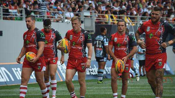 Getting ready: Dragons players warming up for their clash with the Sharks. Picture: Twitter