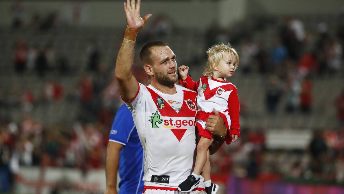 Legend: Jason Nightingale salutes the crowd at Kogarah after his 250th NRL game. Picture: Daniel Munoz/AAP Image