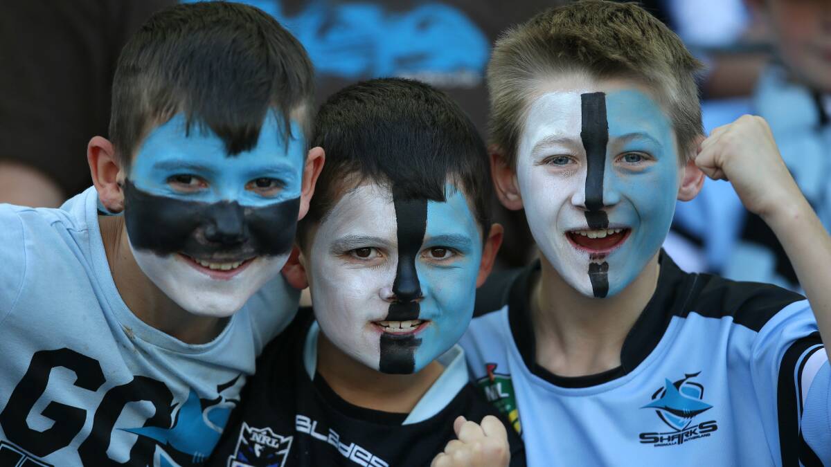Bleeding black, white and blue: Sharks fans at Southern Cross Group Stadium last season. Picture: John Veage