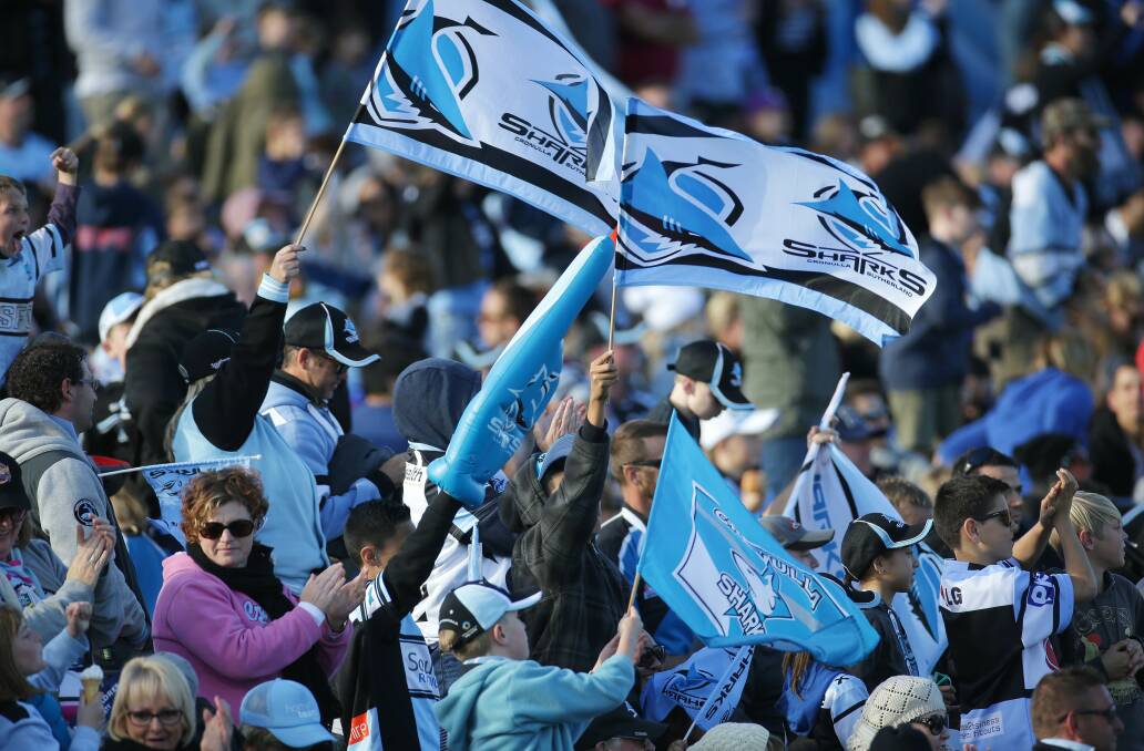Die hards: Cronulla fans turned up in numbers again yesterday as the Sharks downed the Knights. Picture: John Veage