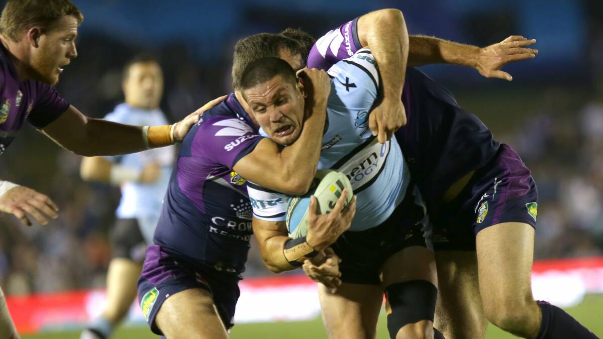 Big effort: Sharks forward Chris Heighington in action against Melbourne this season. Picture: John Veage