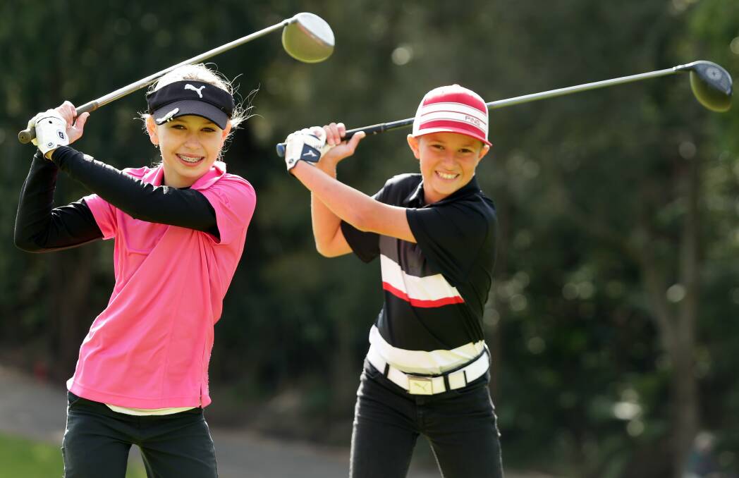 Down the fairway: Young shire golfers Charlotte Perkins (left) and Jordan Ribarovski will compete in the US Kids Golf World Championships next month. Picture: Chris Lane