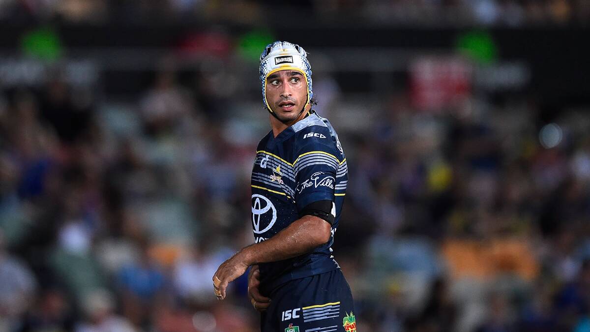 Who me?: Cronulla will need to stop Cowboys halfback Johnathan Thurston. Picture: Ian Hitchcock/Getty Images