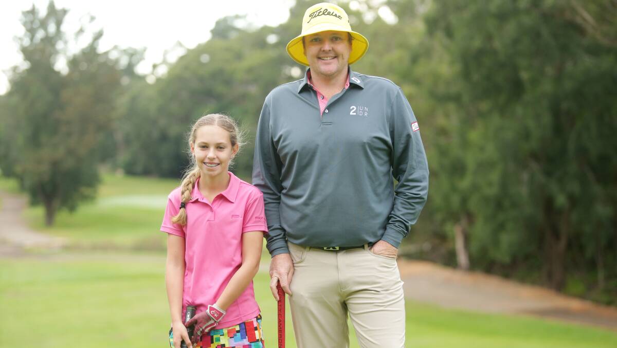 Chance of a lifetime: Kareela golfer Charlotte Perkins with pro golfer Jarrod Lyle. Picture: Chris Lane