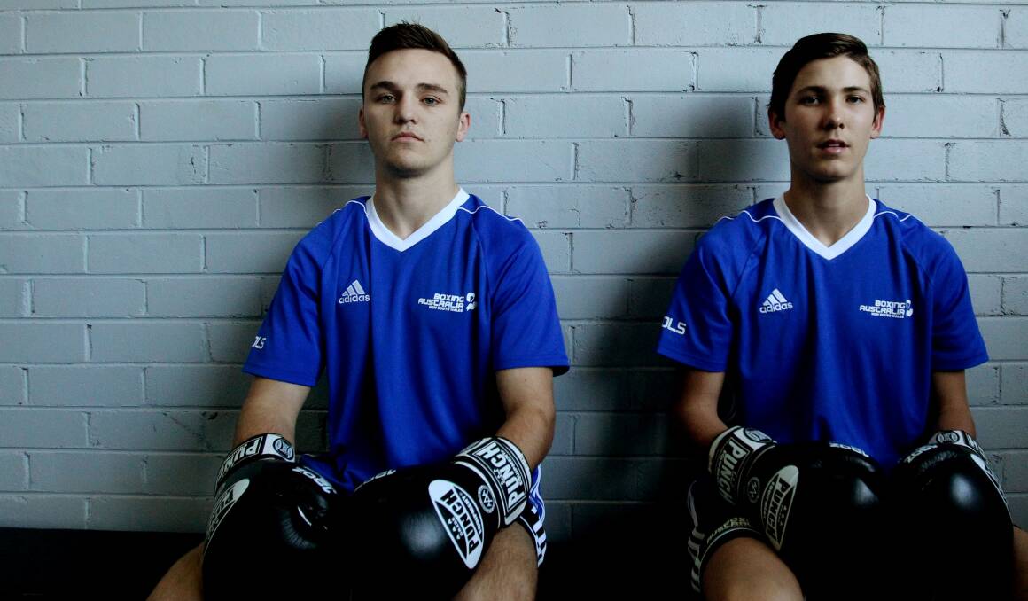Young fighters: Sam Goodman (left) with fellow Sutherland PCYC product Joshua Fitzpatrick. Sam is off to the World Championships in Germany in October. Picture: Chris Lane