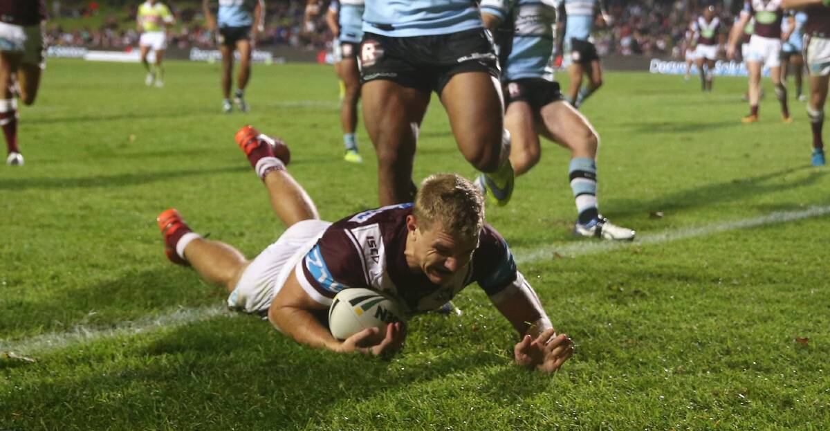 One to watch: Manly's Tom Trbojevic scores against Cronulla. Picture: Mark Kolbe/Getty Images