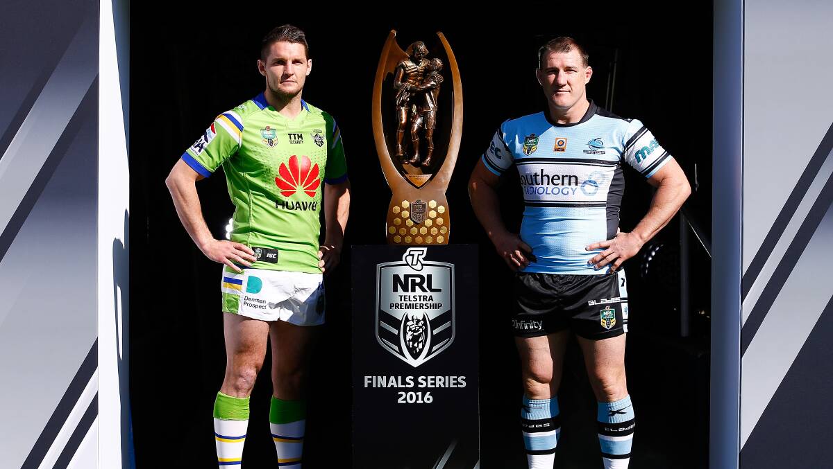 Who wins? Canberra captain Jarrod Croker and Cronulla skipper Paul Gallen. Picture: Getty Images
