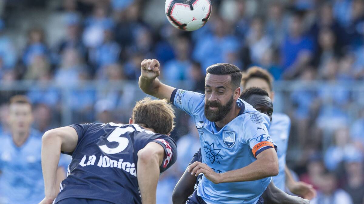 Tough going: Alex Brosque in action against Melbourne Victory at Jubilee Oval. Picture: AAP Image