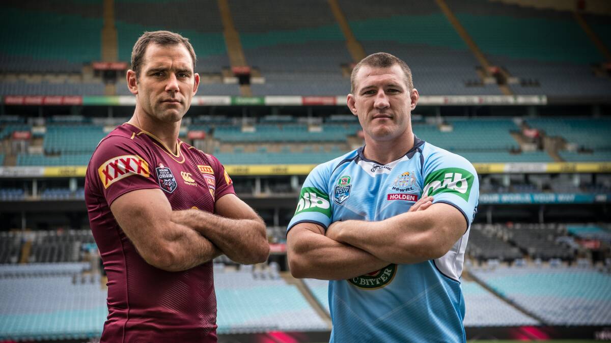 Champions: Queensland captain Cameron Smith (left) with NSW counterpart Paul Gallen. Picture: Wolter Peeters