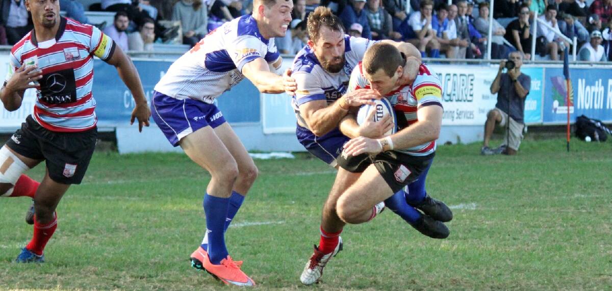 Stopped: Rebels fullback Paul Asquith in action. Picture: Kim Johnson