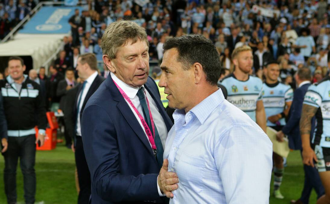 Brains trust: Cronulla coach Shane Flanagan (right) is congratulated by Sharks CEO Lyall Gorman after Cronulla's preliminary final win over the Cowboys last Friday night. Picture: John Veage