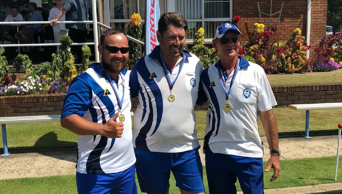 First up win: The Moorefield Bowling Club team of Mark Seghers, Damian Cooper and Cameron Crosby after their president's triples victory. Picture: Supplied
