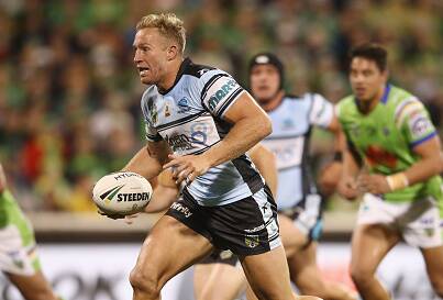 On the charge: Matt Prior on his way to Cronulla's first try on Saturday night. Picture: Getty Images
