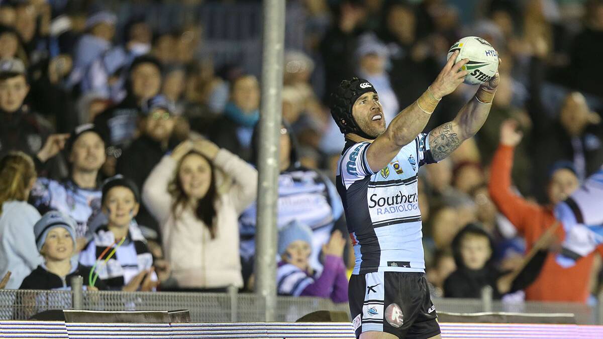 Cheese: Michael Ennis takes a 'selfie' after scoring a try against the Warriors this season. Picture: John Veage