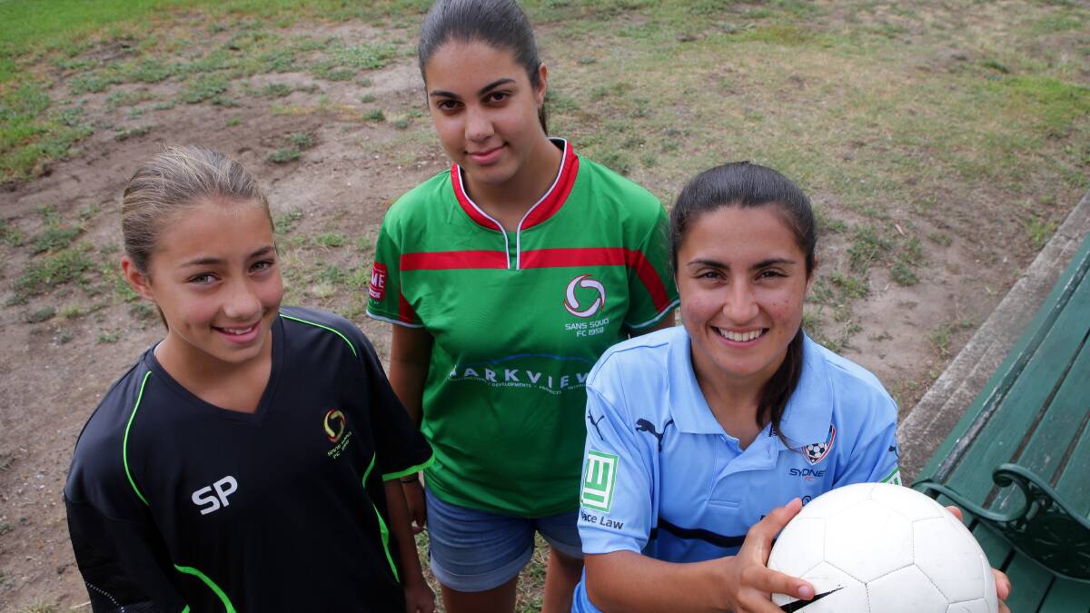 Role model: Sydney FC's W-League captain and St George FA junior Teresa Polias (right) with Sans Souci juniors Cleo and Sotiria. Picture: John Veage