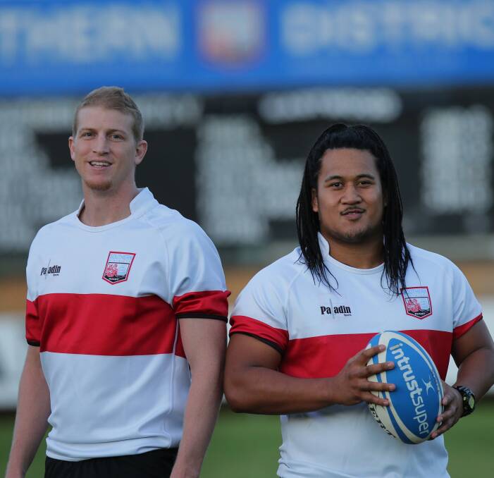 Born and bred: Southern Districts first grade players and St George juniors Luke Smart (left) and Brandon Paenga-Amosa wearing the Rebels' Back to St George jerseys. Picture: John Veage