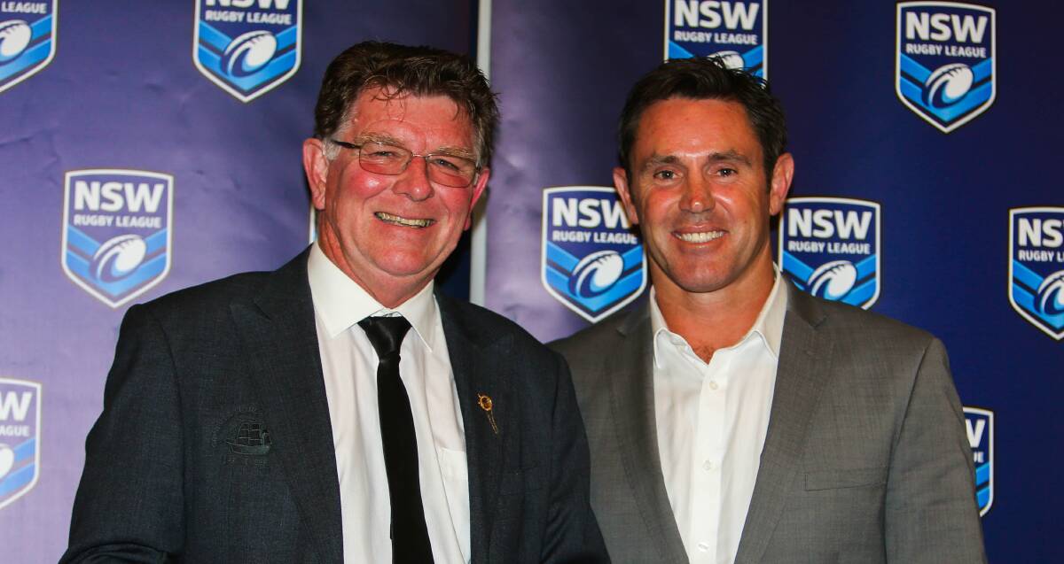 Two champions: Peter Matheson (left) with former great Brad Fittler. Matheson won the NSWRL's prestigious volunteer of the year award. Picture: NSWRL