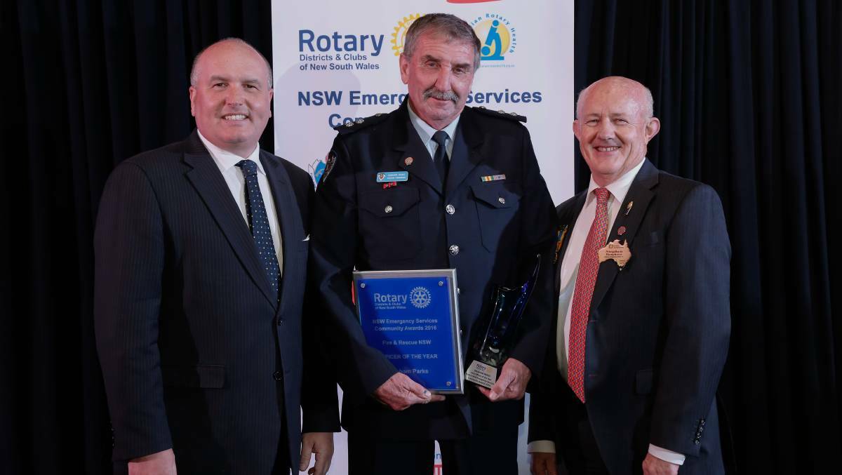 WINNER: Captain Graham Parks (middle) with Emergency Services Minister David Elliott (left) and Rotary 9675 district governor Stephen Humphreys at last year's awards.