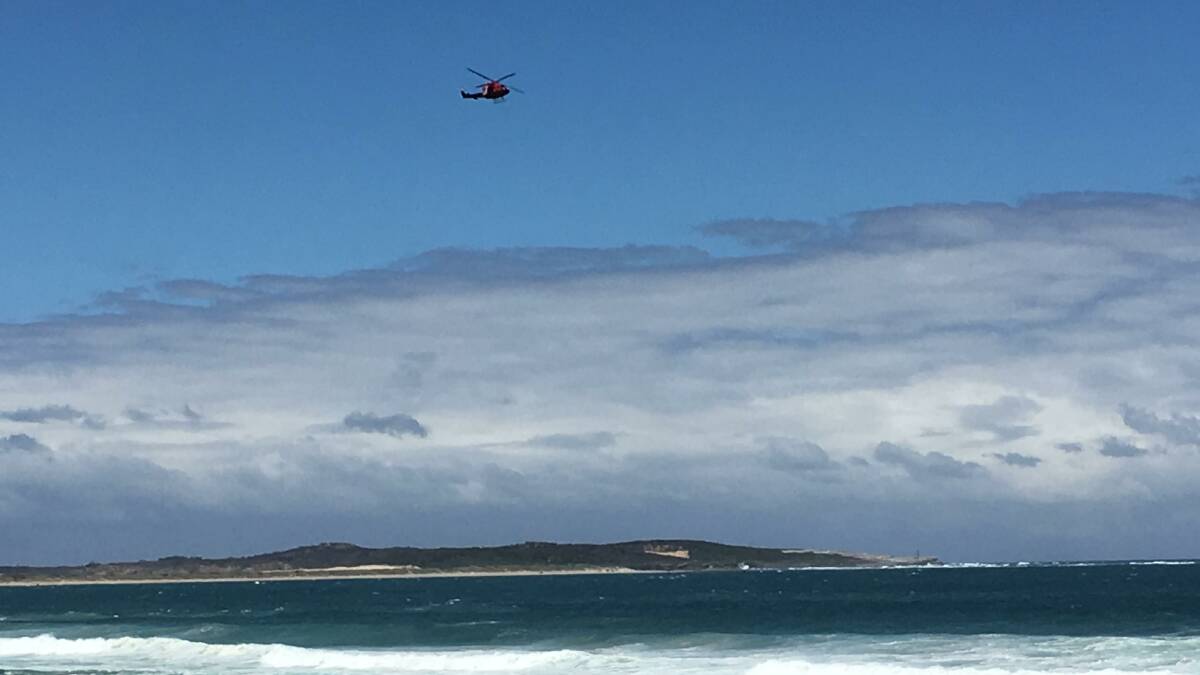 Search: Rescue helicopter looking for the boat today. Picture: Supplied 