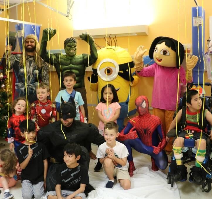 Colourful: Children enjoy a party at St George Hospital recently involving some of their favourite super heroes and characters. Picture: Supplied