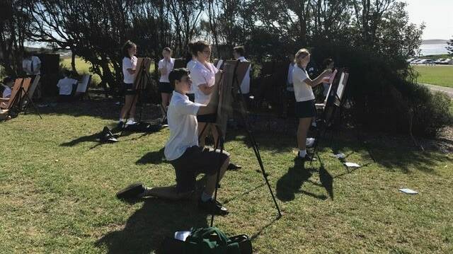 Art exhibit: Students at Cronulla High School prepare for the upcoming exhibition. Picture: Supplied