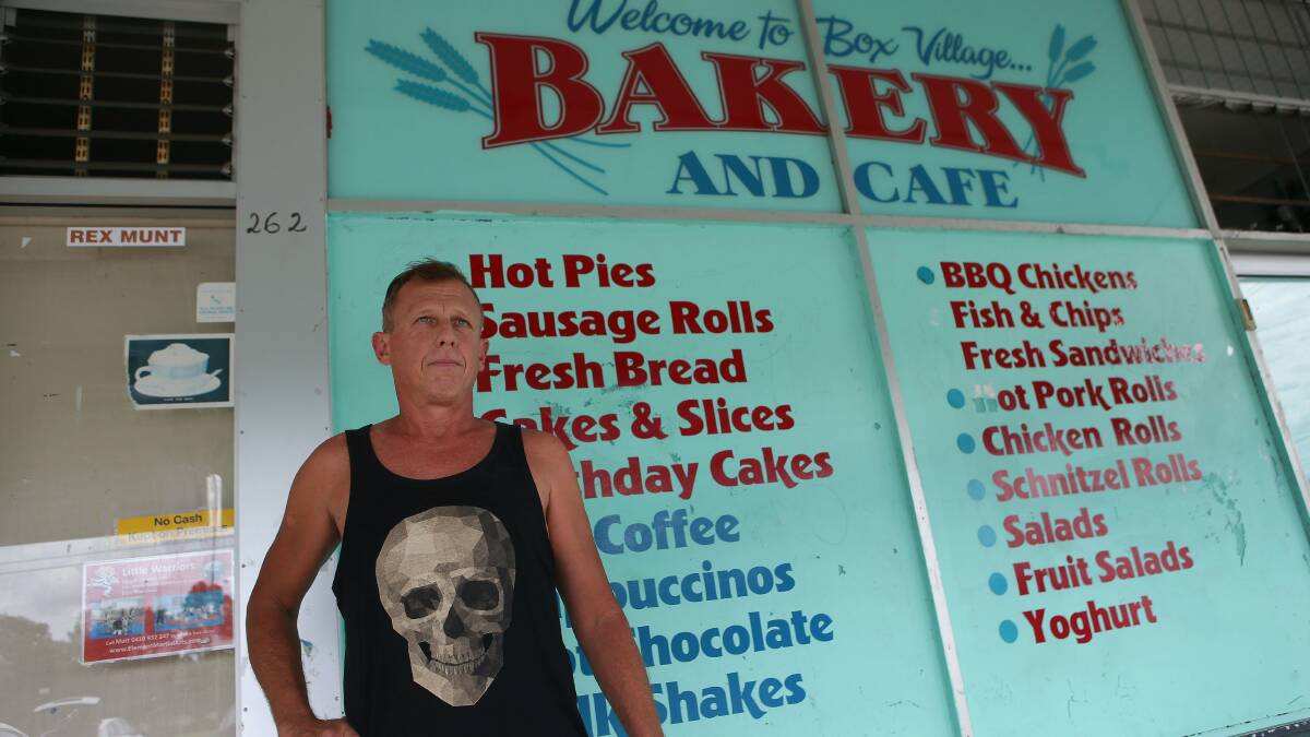 Customer: Ross Paull outside the Sylvania bakery early last year, where his family got sick. Picture: John Veage