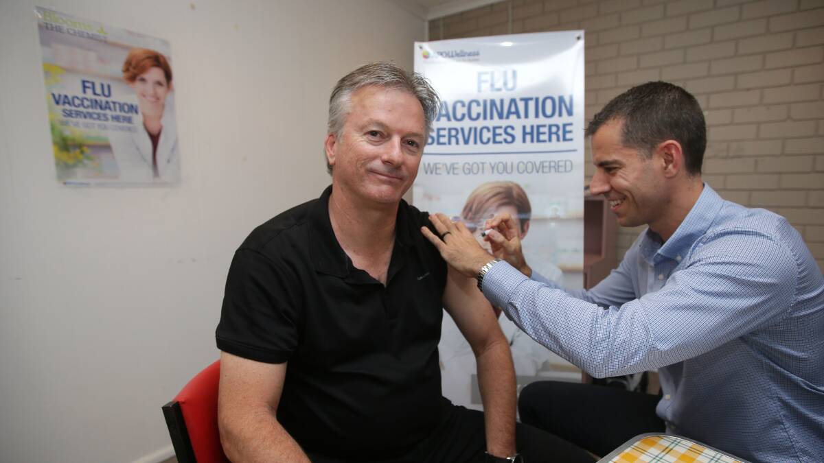 Vaccination: Australian cricket legend Steve Waugh getting his flu jab today in Cronulla. Picture: John Veage