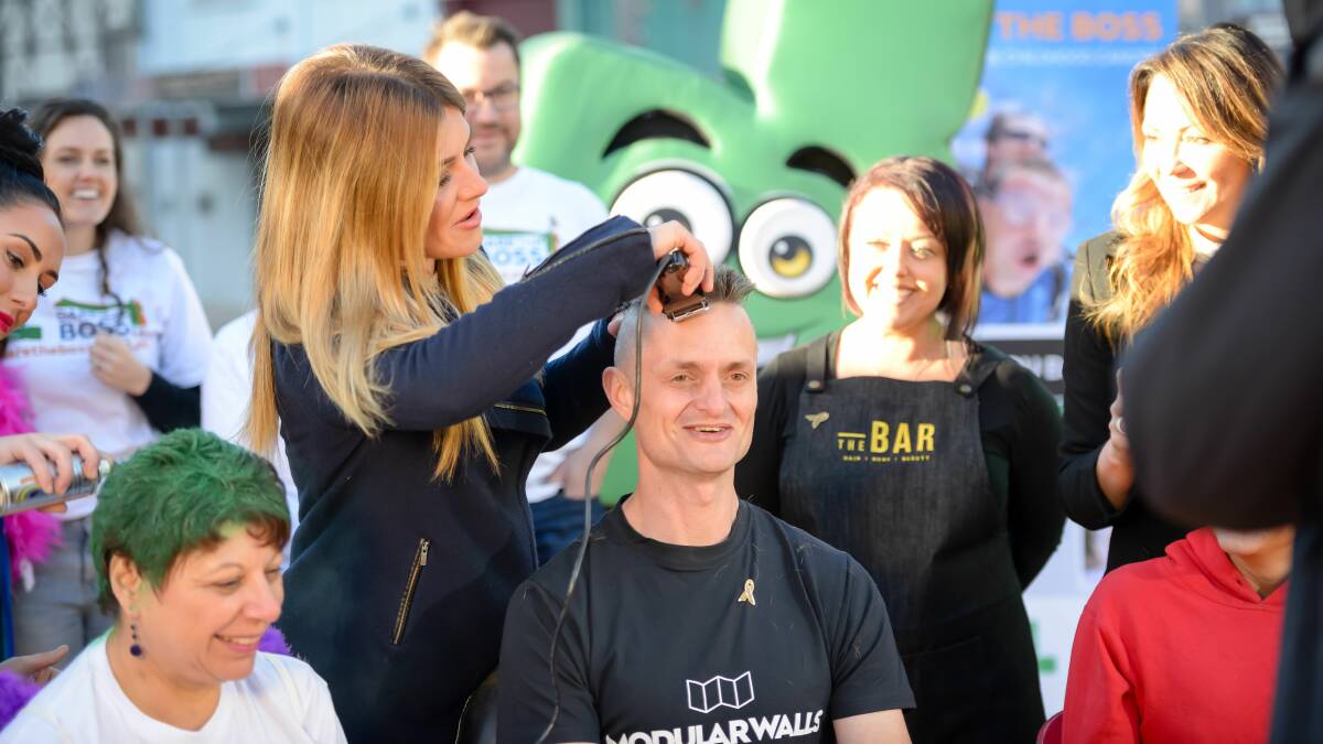 Dare: Modular Walls (Kurnell) chief executive Nick Holden gets his head shaved. Picture: Supplied