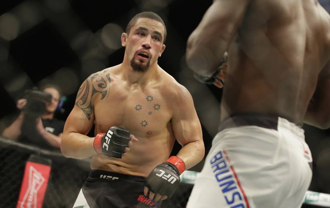 MMA: Sylvania Waters fighter Robert Whittaker has notched up another win in the UFC. He is pictured in action yesterday. Picture: Darrian Traynor/Fairfax Media