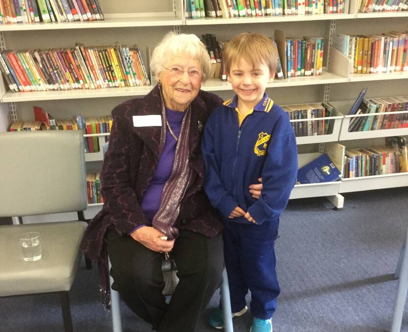 Centenary celebration: Past student Enid Carter, 101, recently visited the school to talk with students. Also pictured is the school's youngest pupil Rory, 5. Picture: Supplied