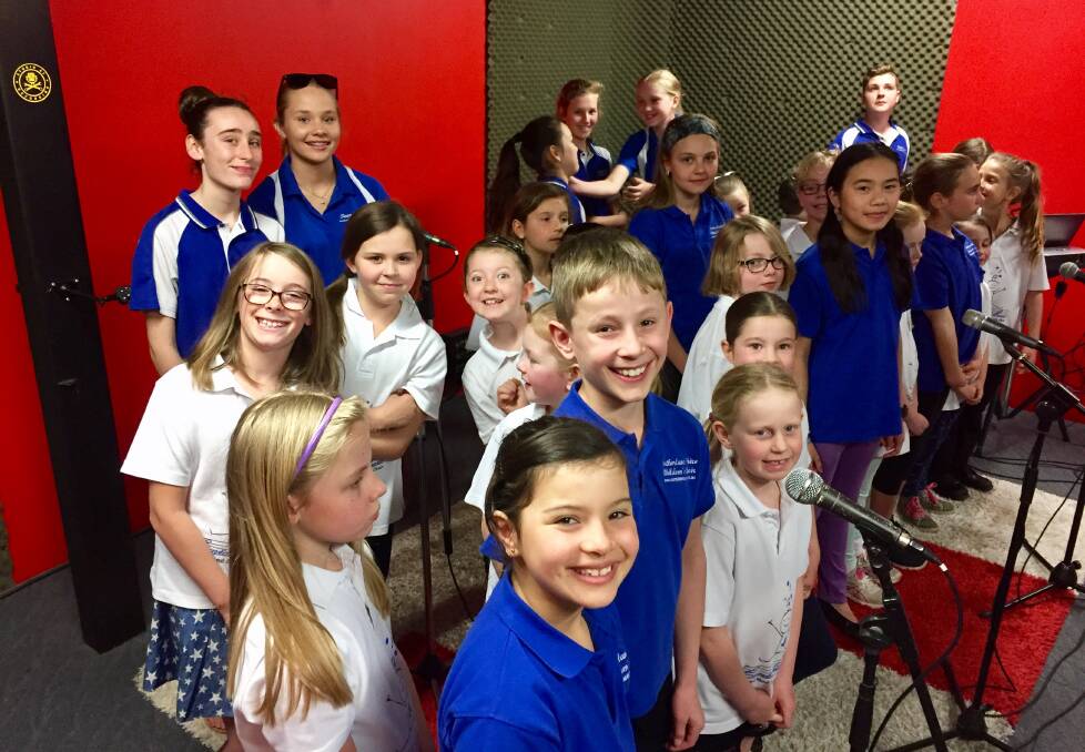Jingle Bells: The children during their album recording at Studio 57 in Taren Point. Picture: Supplied