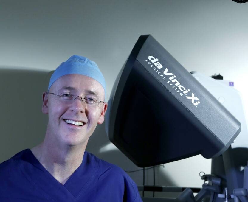Ground-breaking: Associate Professor Michael Talbot with the da Vinci Xi Surgical System. Picture: Supplied