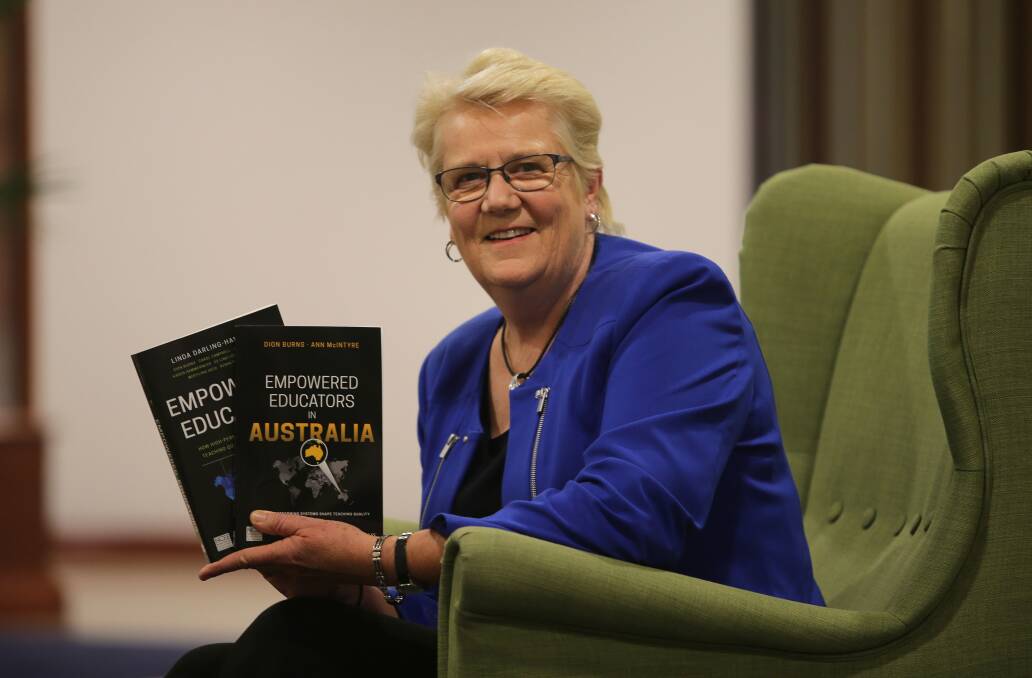 Education: Cronulla's Ann McIntyre with the two books she has authored and co-authored. Picture: John Veage