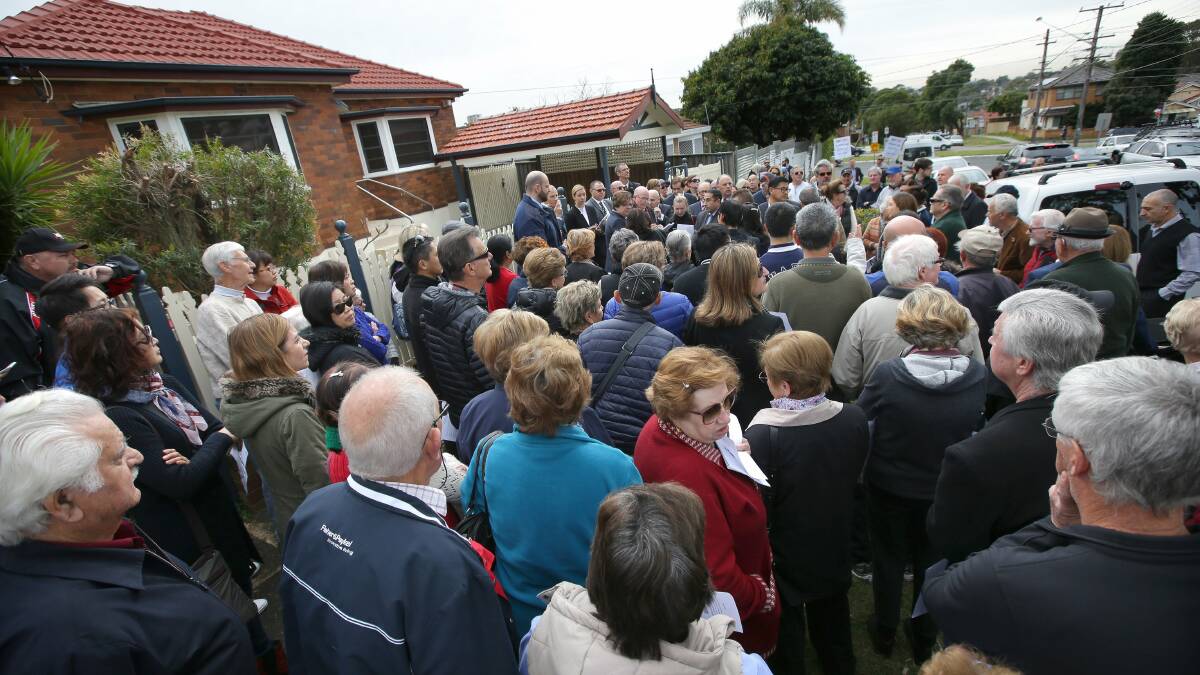 Opposition: Hundreds of residents showed their opposition to the proposed mosque at South Hurstville during an onsite meeting of the Land and Environment Court on Monday. Picture: John Veage