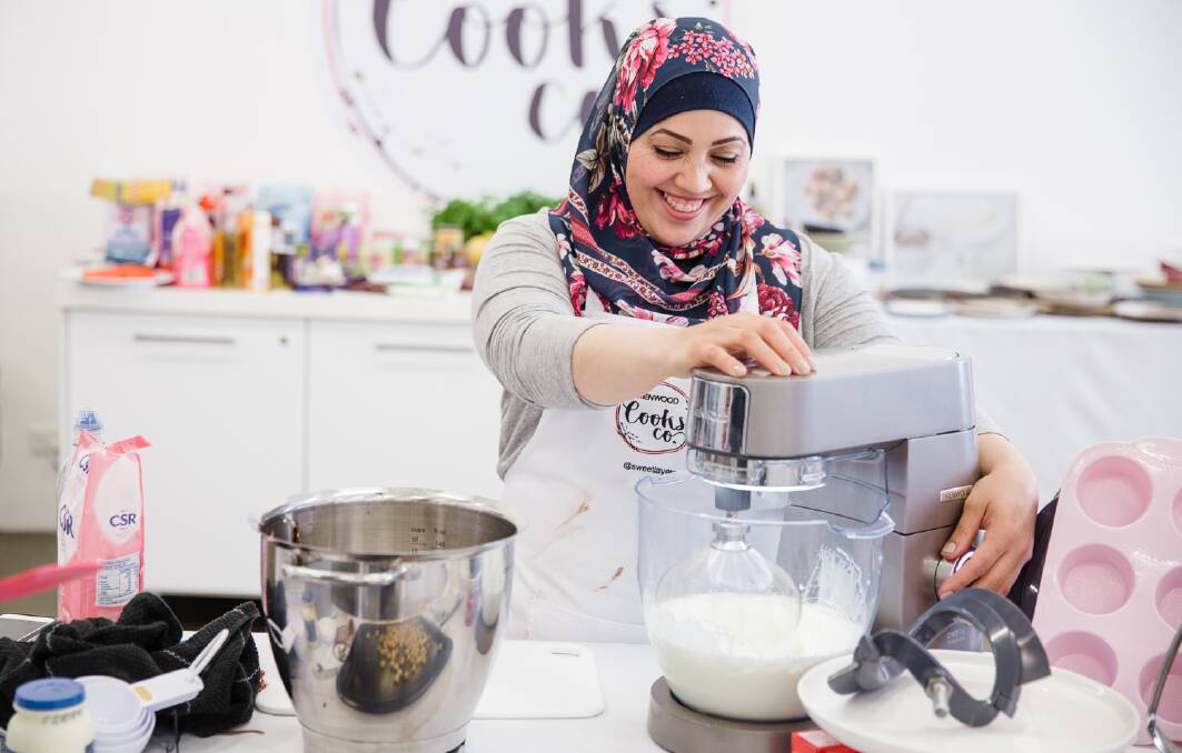 Inspired: Almaza Soummaka cooks up a storm during the Kenwood Cooks Collective. Picture: Supplied
