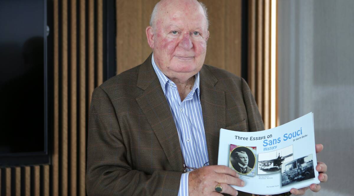 History: Garry Darby with his book of essays. Picture: John Veage