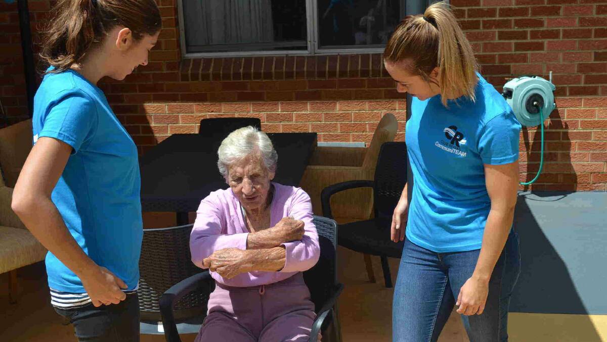 Giving back: Club Rivers staff visit a Narwee nursing home. Picture: Supplied