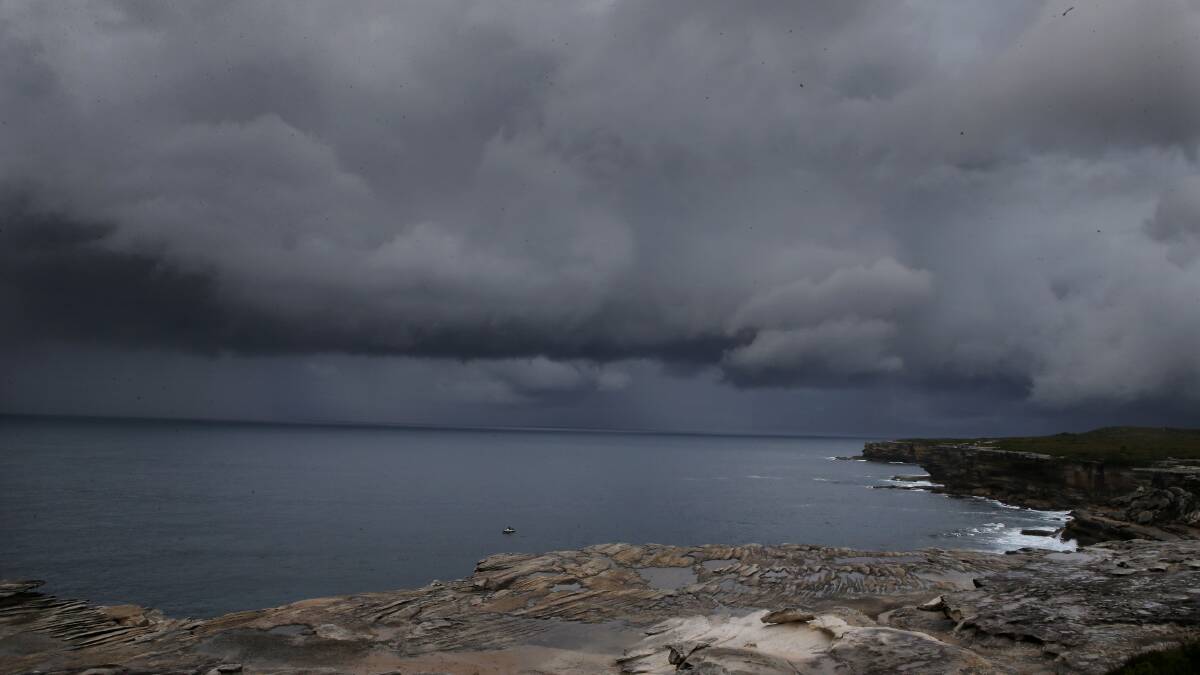 Ominous: Dark clouds roll into Kurnell earlier today. Picture: John Veage