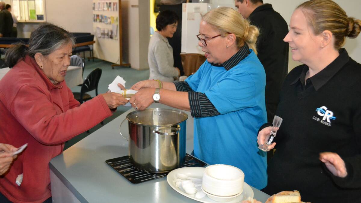 Help: Club Rivers volunteers helped hand out meals recently. Picture: Supplied