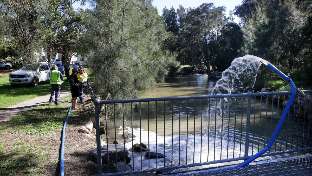 Creek damage: Fresh water is pumped into a Ramsgate creek after hundreds of fish were found dead. Picture: John Veage