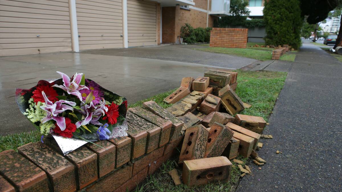 Tribute: Flowers mark the spot when a woman was hit and killed on Sunday. Picture: John Veage.
