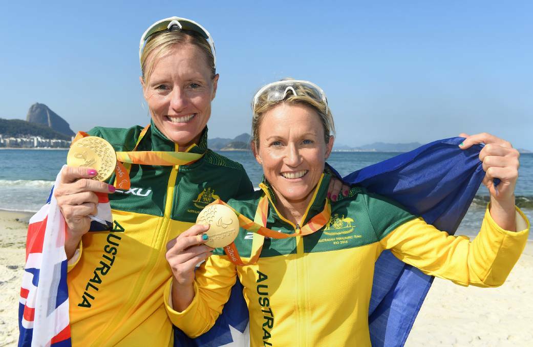 Katie Kelly with guide Michellie Jones wins gold in the Women's PT5 Triathlon in a time of 1:1:18. Picture: Australian Paralympic Committee