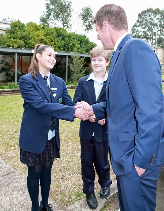 Youth voice: ​Valandou Contzonis pictured with fellow student Jeremy Hockings, meets NSW Premier Mike Baird, ahead of 2016 YMCA junior Parliament.