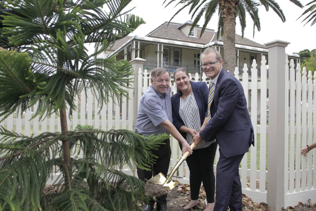 Digging through history: Bayside Council mayor Bill Saravinovski, councillor Vicki Poulos and The Scots College principal Ian Lambert plant a project for the next 100 years.

