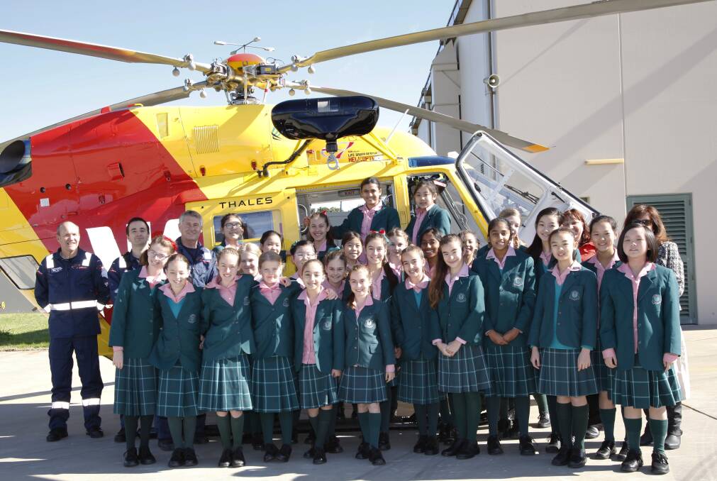 Community visit: Danebank students get a close look at the rescue helicopter used by crew from the southern region base.