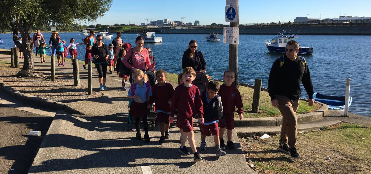 Nice day for a walk: Kyeemagh Public School pupils take the scenic route.